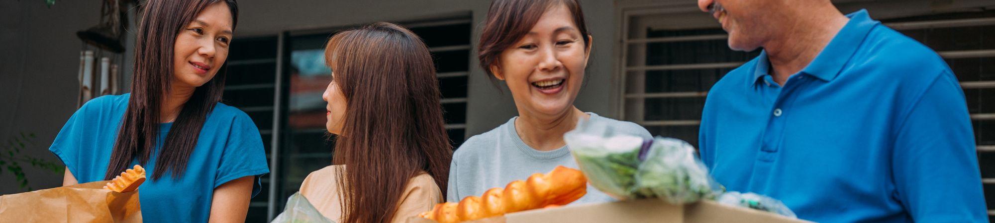 Family packing food boxes
